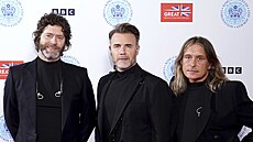 Howard Donald, Gary Barlow a Mark Owen z kapely Take That na koncertì v rámci...